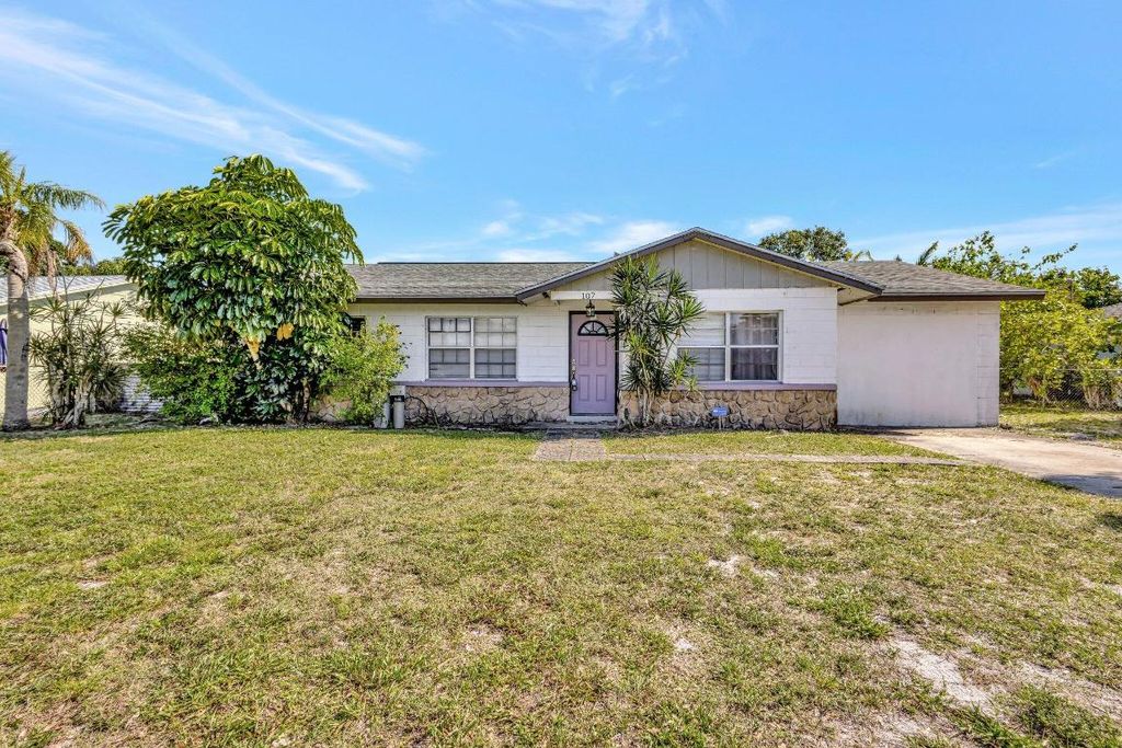Photo of 107 Gotham Drive, Fort Pierce, FL 34946 (MLS # R11081729)