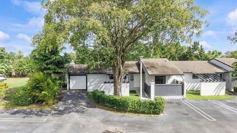 Photo of 107 Conaskonk Circle, Royal Palm Beach, FL 33411 (MLS # R11168708)