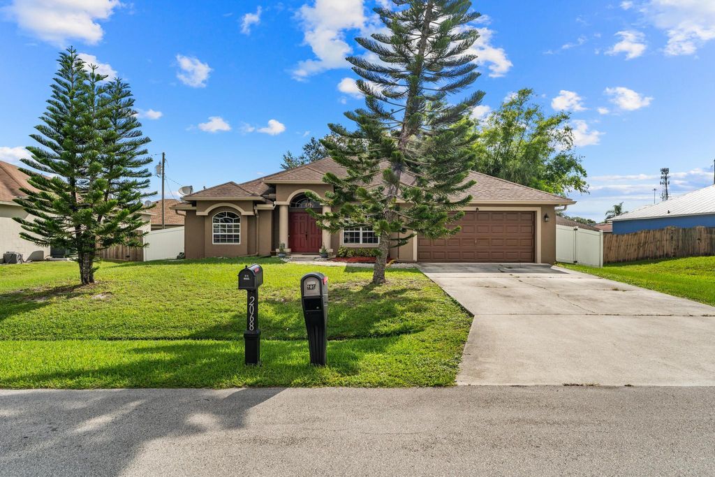 Photo of 2067 SW Mcallister Lane, Port Saint Lucie, FL 34953 (MLS # R11114509)