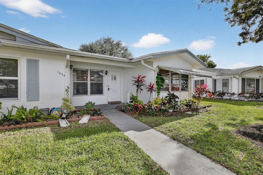 Welcome to your dream home! Nestled on a charming corner lot, this inviting residence boasts a breathtaking lake view that will captivate your heart in LAUDERDALE WEST AN ACTIVE 55+ COMMUNITY. Recently refreshed with a fresh coat of paint and new laminated floors, along with NEW blinds. This cozy abode offers spacious closets and an abundance of natural light, creating a warm and welcoming atmosphere. Enjoy the convenience of numerous amenities, including lawn, basic cable, internet,2 clubhouses, pools, tennis counts, fitness center, card rooms, organized clubs, bus service, roof repairs/replacements, exterior painting and pest control. Don’t miss the opportunity to make this beautiful property your own!