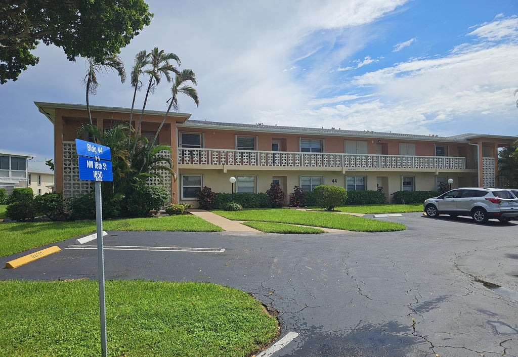 Photo of 1850 NW 18TH Street #101, Delray Beach, FL 33445 (MLS # B26078280)