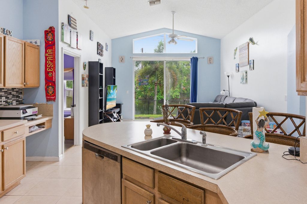 Photo of 1724 Sawgrass Circle, Greenacres, FL 33413 (MLS # B26018432)