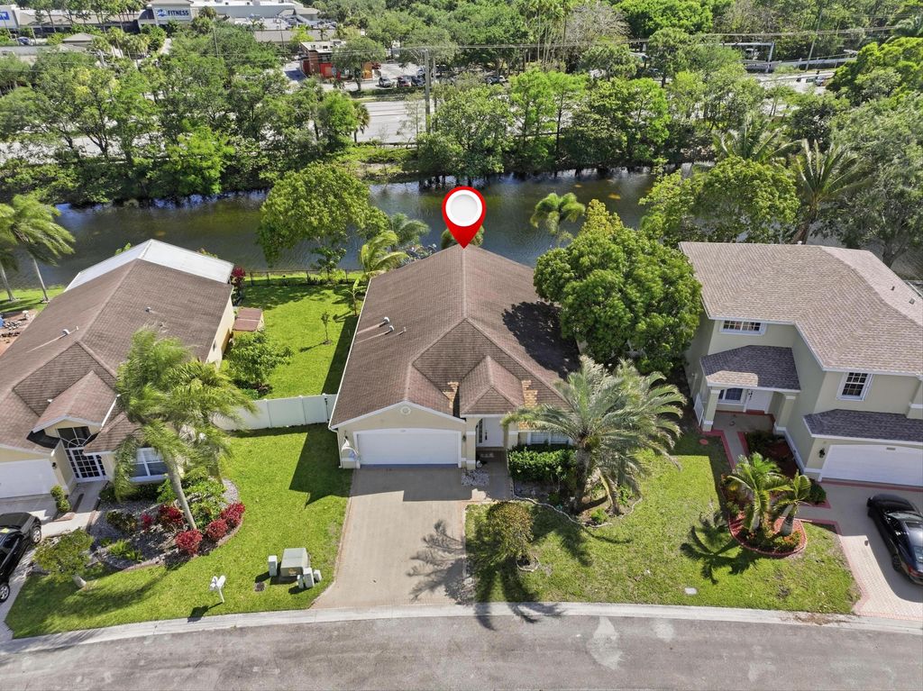 Photo of 1724 Sawgrass Circle, Greenacres, FL 33413 (MLS # B26018432)