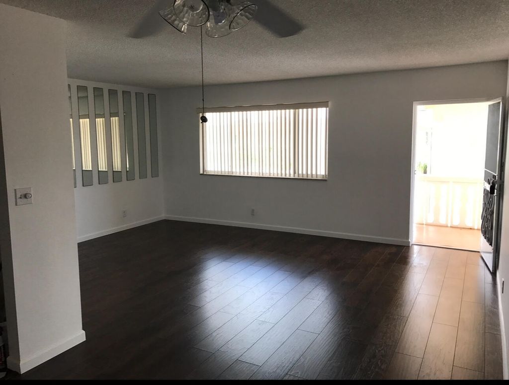 Photo of 700 Village Green Court #302, Palm Springs, FL 33461 (MLS # B26014412)