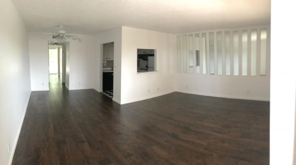 Photo of 700 Village Green Court #302, Palm Springs, FL 33461 (MLS # B26014412)