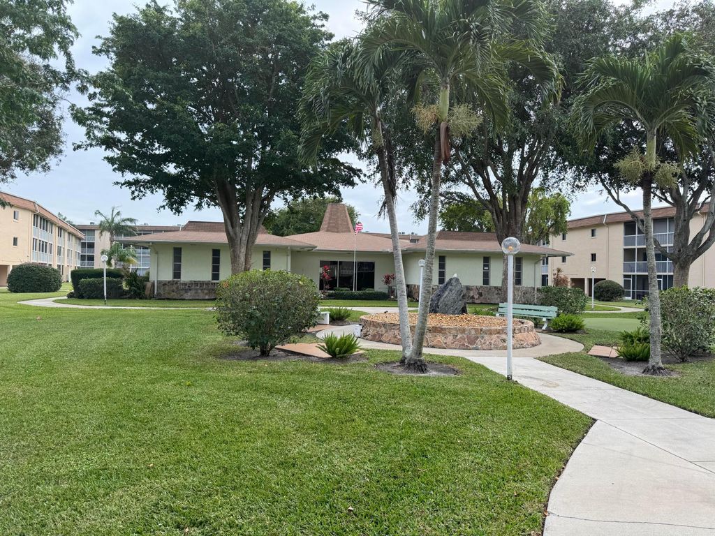 Photo of 700 Village Green Court #302, Palm Springs, FL 33461 (MLS # B26014412)