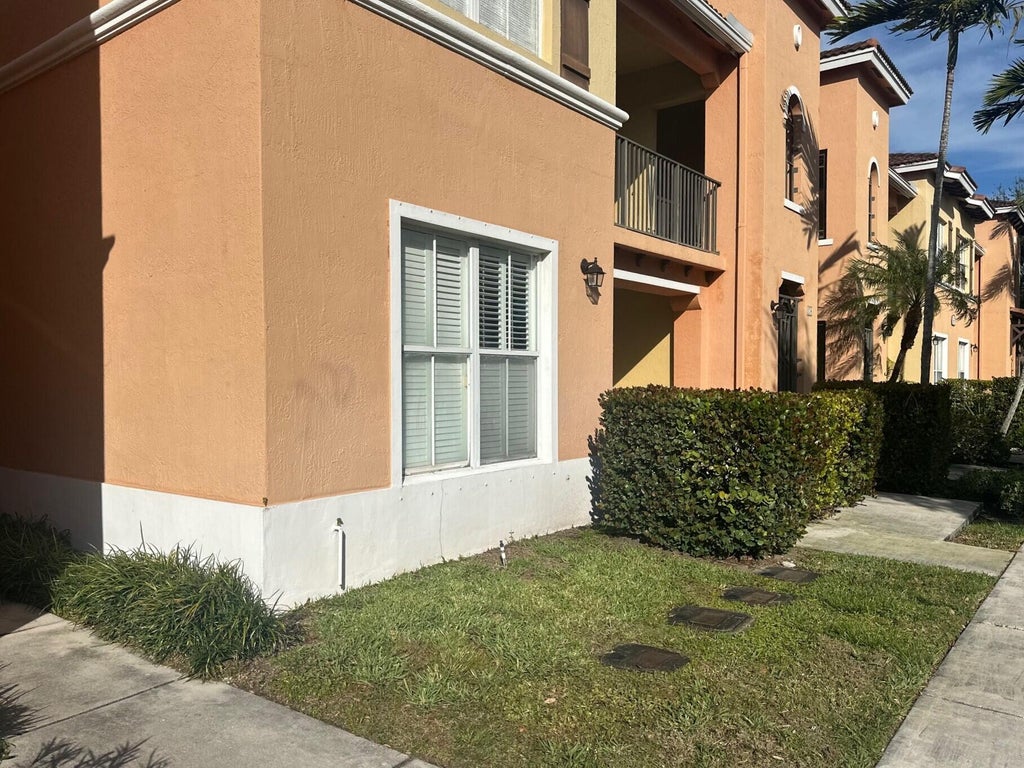 Photo of 3569 Forest Hill Boulevard #103, Palm Springs, FL 33406 (MLS # R11058046)