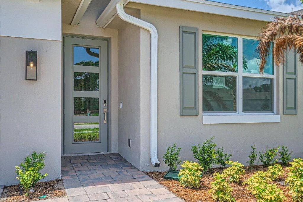 Photo of 6691 SE Park Trace Drive, Stuart, FL 34997 (MLS # R10958491)