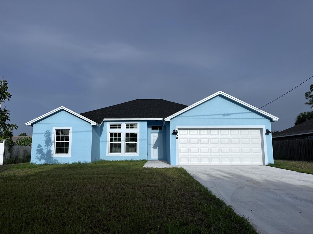 Photo of 3650 SW Ballweg Street St NE, Port St Lucie, FL 34953 (MLS # R10824045)