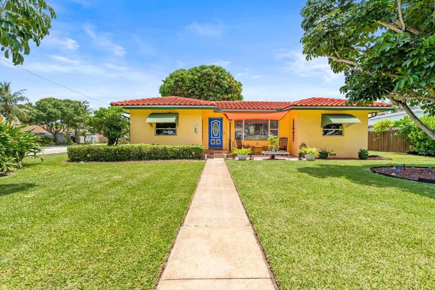 Wake up to lake views and endless possibilities. This unique property offers 5 bedrooms and 3 baths, located directly across from beautiful Lake Osborne and John Prince Park awaiting your morning walk. The main home features 3 bedrooms and 2 bathrooms with solid CBS construction and a welcoming layout. The backyard is a peaceful retreat with a deck and patio, perfect for morning coffee, sunset dinners, or gathering with friends. The newly renovated guest house includes 2 bedrooms and 1 bathroom and is completely turnkey, ideal for extended family, visitors, or flexible living. Both homes welcome you to a light, bright and inviting space ready for your serene experience.  Enjoy a relaxed Florida lifestyle just minutes from downtown Lake Worth, with dining, shopping, parks, and beaches near