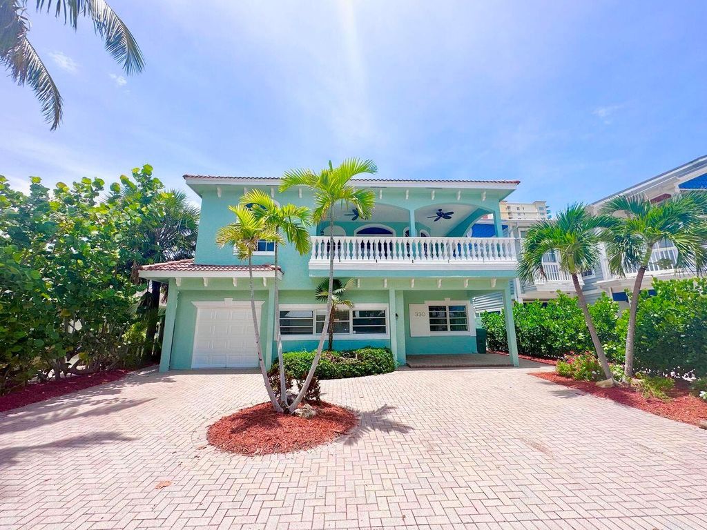 Photo of 330 E 25th St, Riviera Beach, FL 33404 (MLS # R11138188)