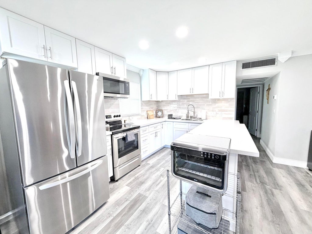 Photo of 137 BRITTANY C Terrace, Delray Beach, FL 33446 (MLS # B26078084)