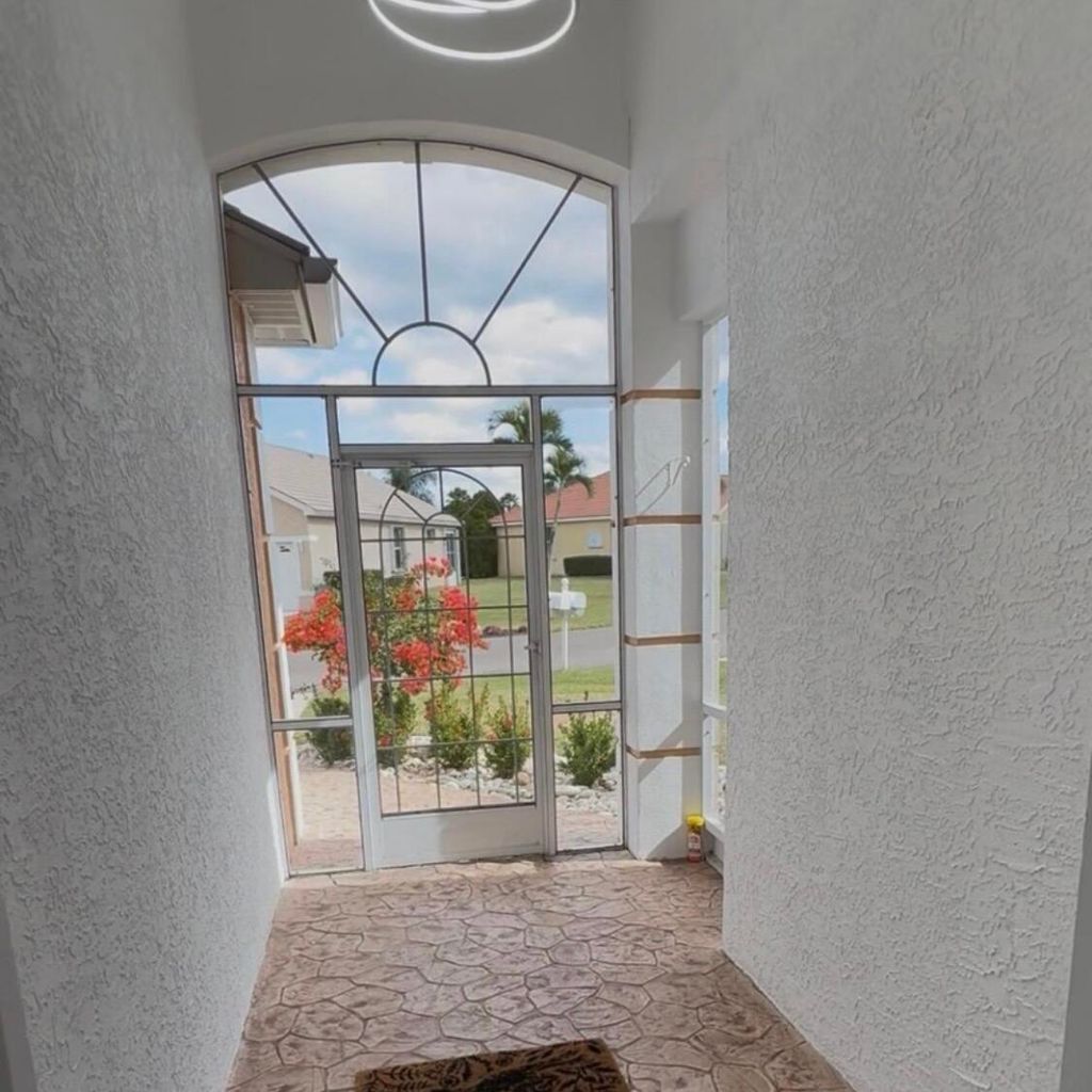 Photo of 822 NW Sorrento Lane NW, Port Saint Lucie, FL 34986 (MLS # B26026524)