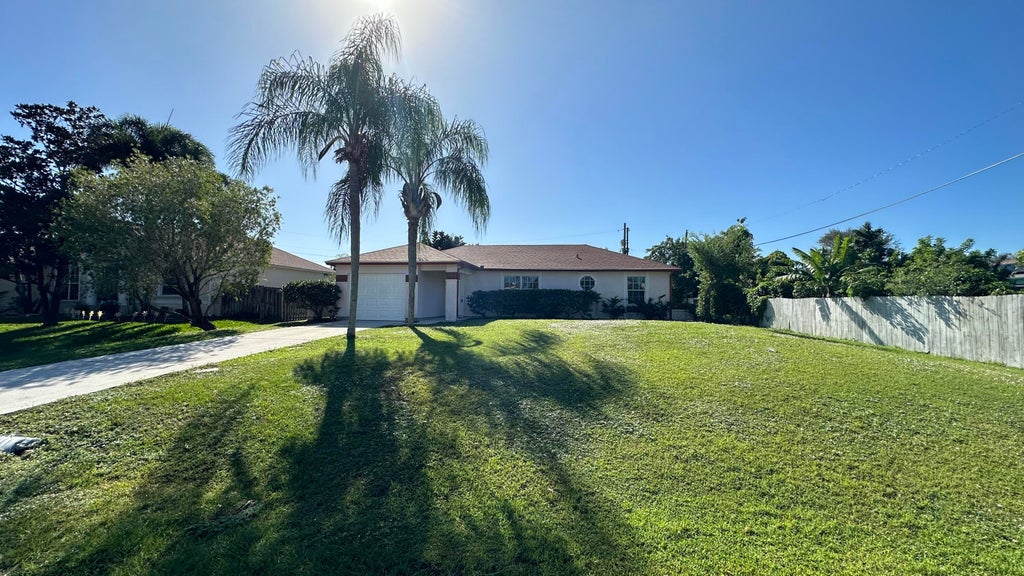 Photo of 359 SW Dalton Circle, Port Saint Lucie, FL 34953 (MLS # R10926054)
