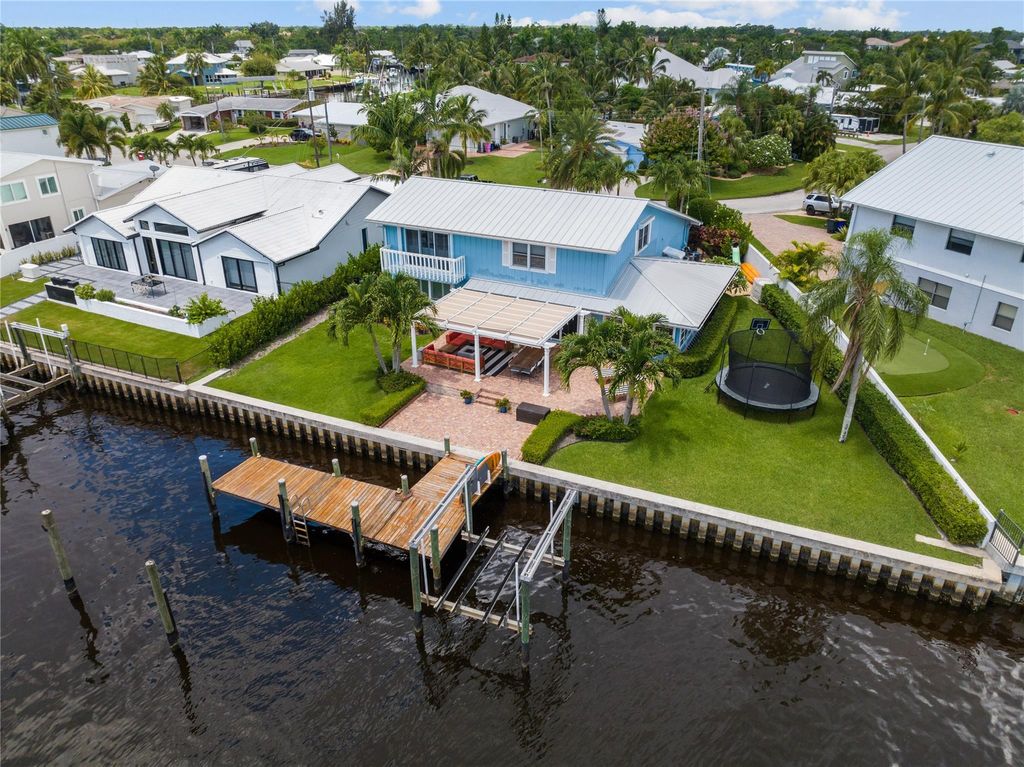 Photo of 24 SW Riverway Blvd, Palm City, FL 34990 (MLS # F10403944)