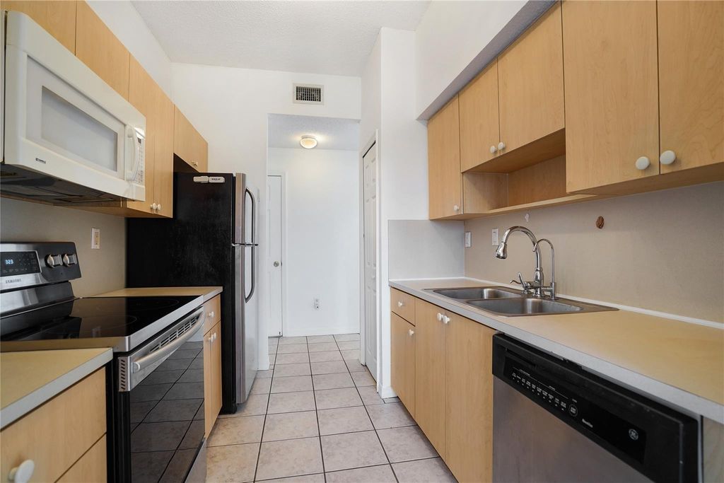 Photo of 7085 Nova Drive #319, Davie, FL 33317 (MLS # B26021331)
