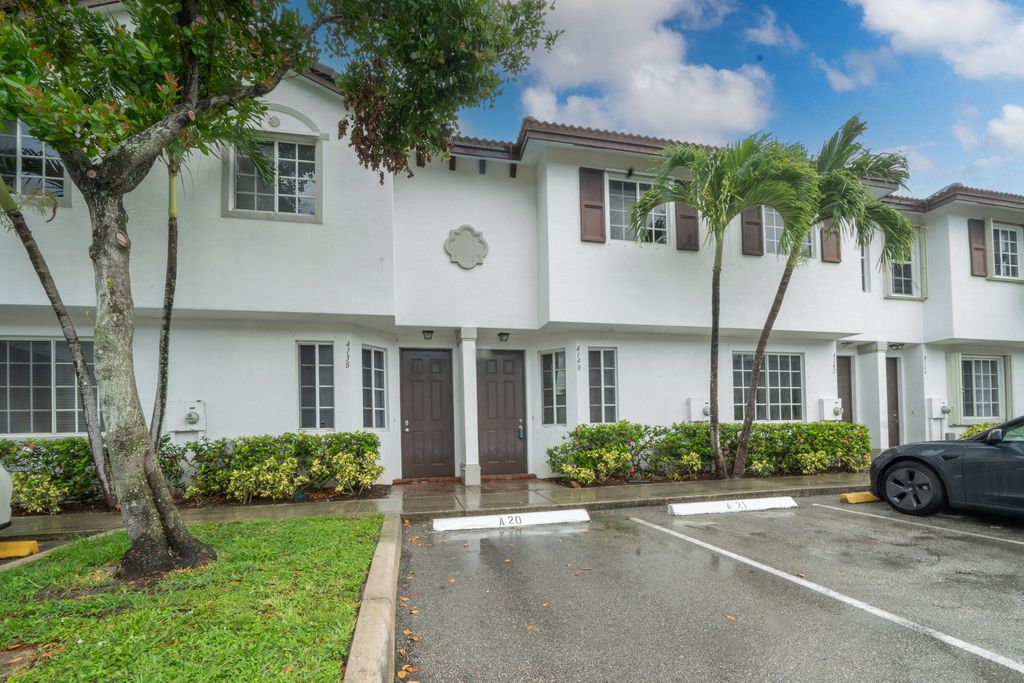 Photo of 4140 Napoli Lake Drive, Riviera Beach, FL 33410 (MLS # R10901080)