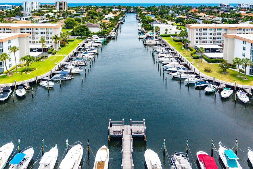 Great end unit, bright with a view of Tropic Isle Community & some Intracoastal view. Complete Impact Glass just installed. New floors & painted throughout. New lanai floor, roof installed in 2025, elevator installed 2023. Lovely marina for boats up to 40 feet & fee is  19.25 per foot per year.  Tropic Bay also offers lovely landscaping, a putting green, Shuffle Board, Billiards, a Golf League, Pickle Ball League, a book club, cooking club, card groups, parties for every occasion, 3 pools a Boat House with a gym, library great kitchen & party/ meeting room, a Club House with a large meeting/event room, great kitchen & bar area & billiards. Tropic Bay has a fantastic location in east Delray  with the ability to walk to several restaurants, Trader Joes, J Crew Factory, Nordstrom Rack, etc.