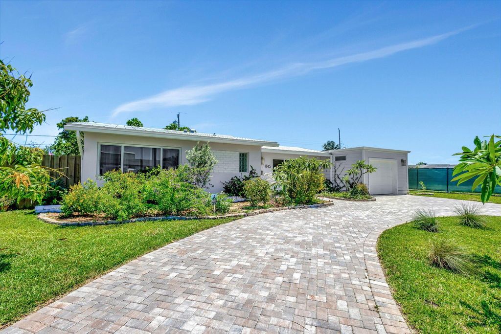Photo of 845 Dogwood Road, North Palm Beach, FL 33408 (MLS # R10971573)