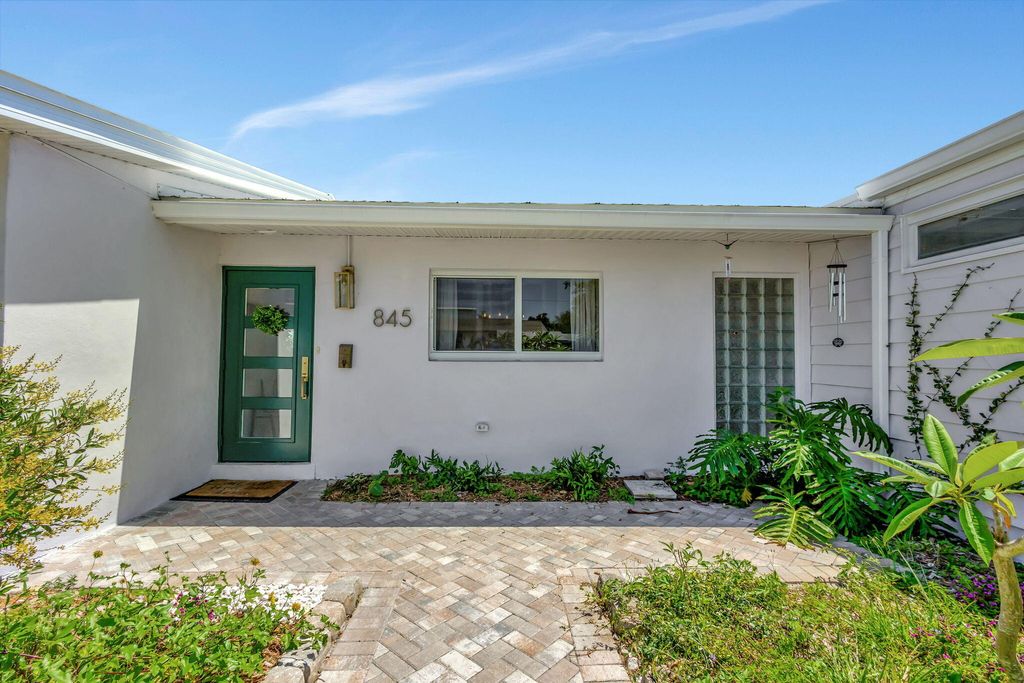 Photo of 845 Dogwood Road, North Palm Beach, FL 33408 (MLS # R10971573)