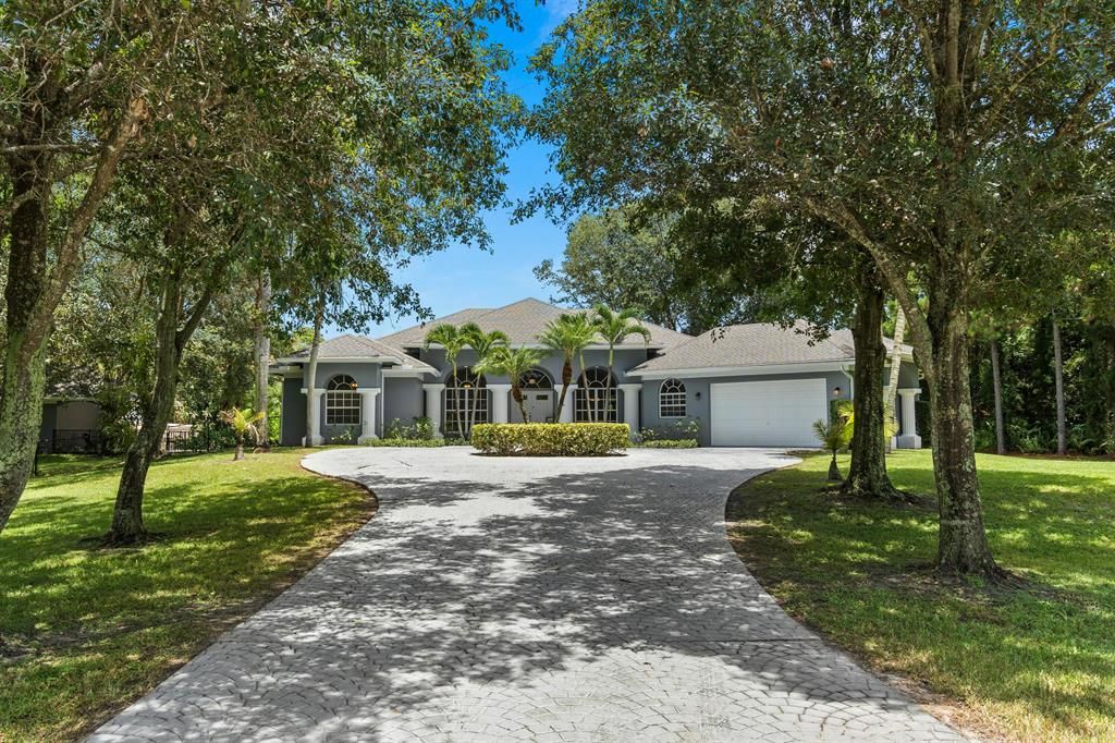 Photo of 7087 155th Place Pl N, Palm Beach Gardens, FL 33418 (MLS # R10823610)