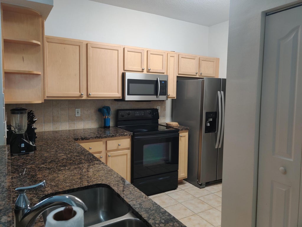 Photo of 224 E MURCIA Drive #201, Jupiter, FL 33458 (MLS # B26078299)