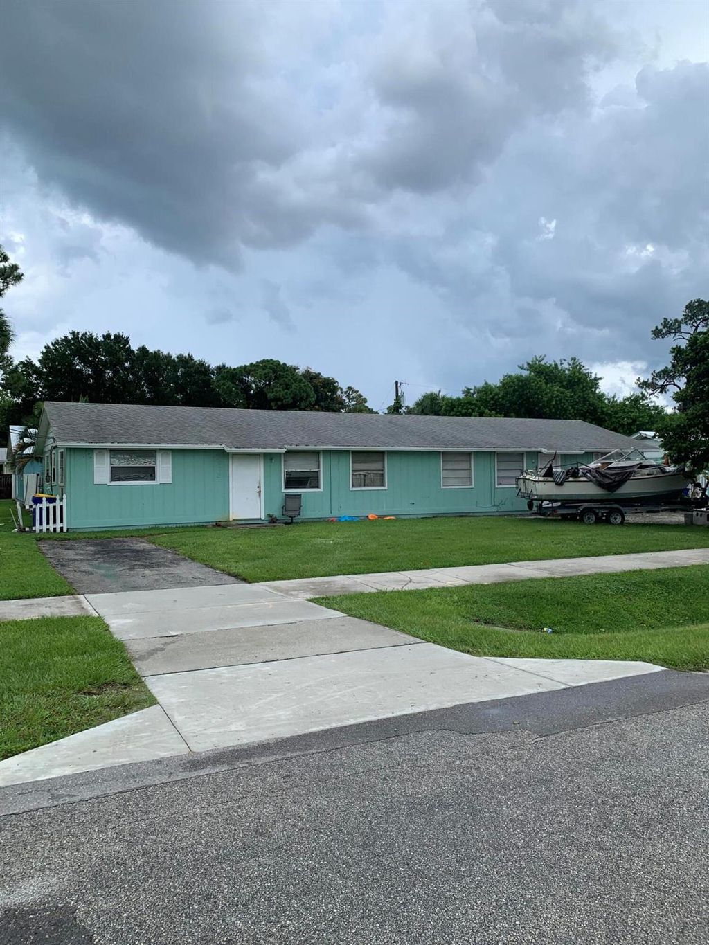 Photo of 2973 SE Camino Avenue, Stuart, FL 34997 (MLS # R10908593)