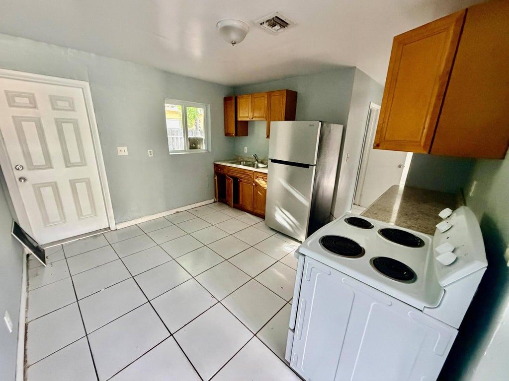 Photo of 1132 NW 5TH Court #1A, Fort Lauderdale, FL 33311 (MLS # B26081374)