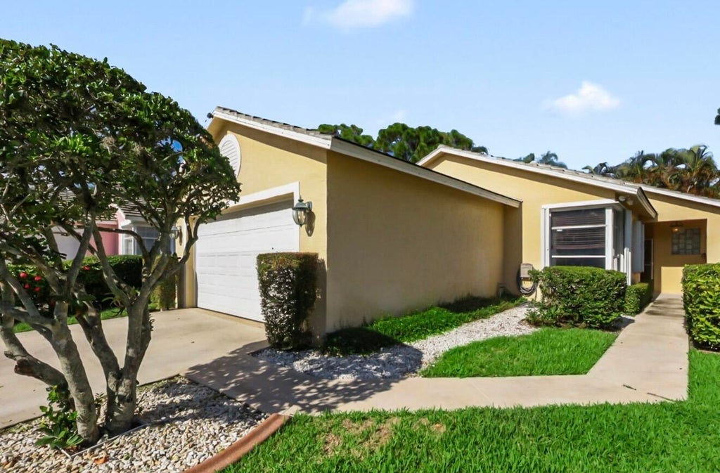 Photo of 172 HARBOR LAKE Circle, Greenacres, FL 33413 (MLS # B26073026)