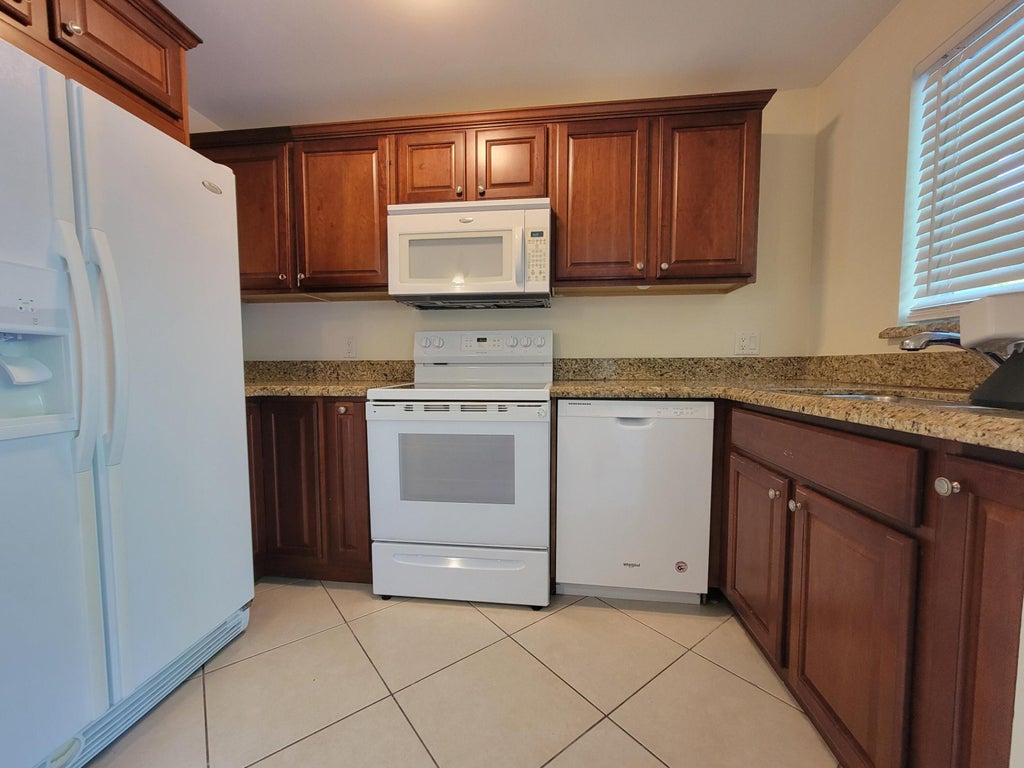 Photo of 1727 Jimmy Buffett Mem Highway #107, Vero Beach, FL 32963 (MLS # B26078400)