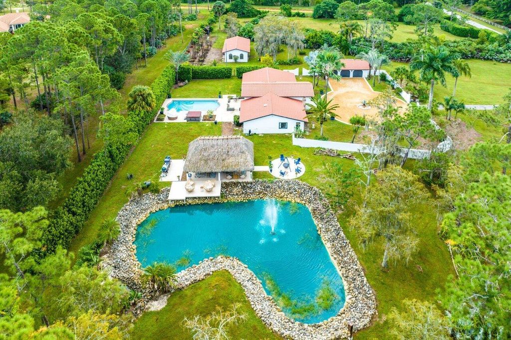 Photo of 13619 Deer Creek Drive, Palm Beach Gardens, FL 33418 (MLS # R11033985)