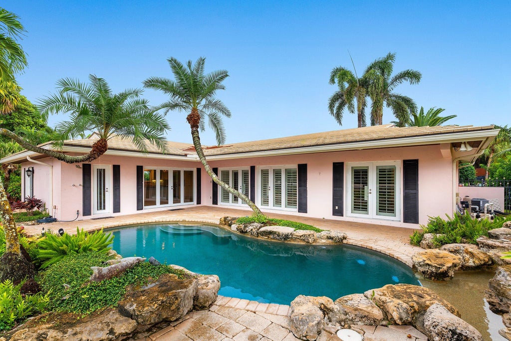 Photo of 122 Marlin Drive, Ocean Ridge, FL 33435 (MLS # B26077052)