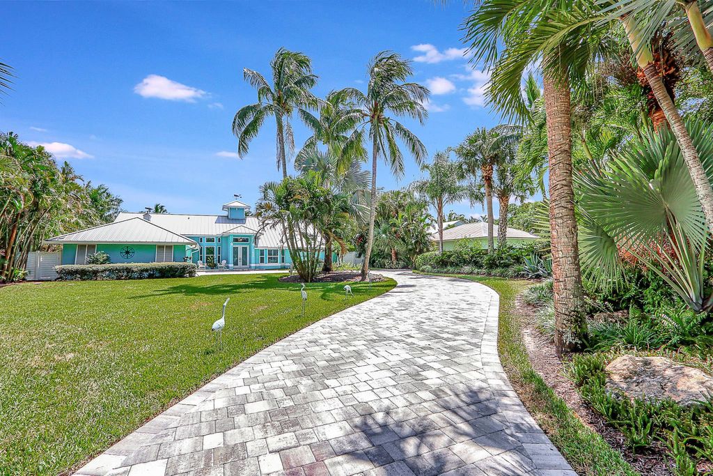 Photo of 3659 SW Saint Lucie Shores Drive, Palm City, FL 34990 (MLS # R10923118)