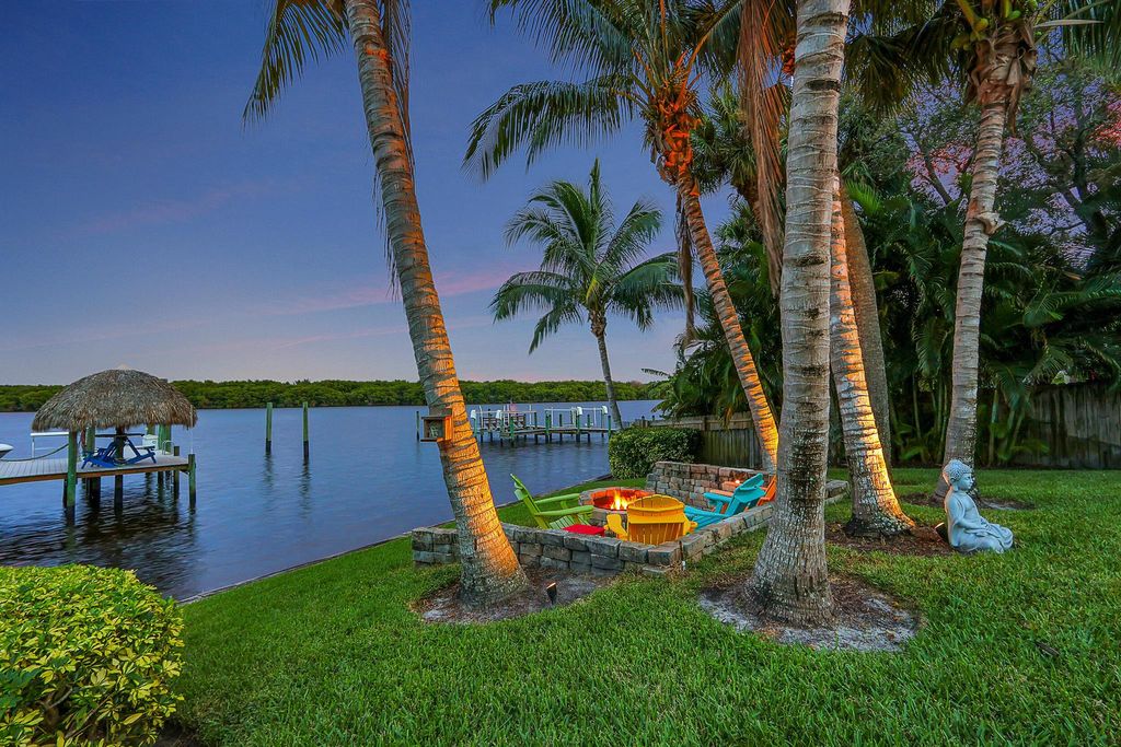 Photo of 3659 SW Saint Lucie Shores Drive, Palm City, FL 34990 (MLS # R10923118)