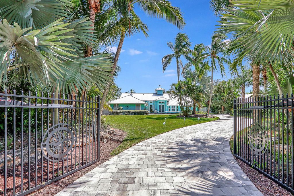 Photo of 3659 SW Saint Lucie Shores Drive, Palm City, FL 34990 (MLS # R10923118)