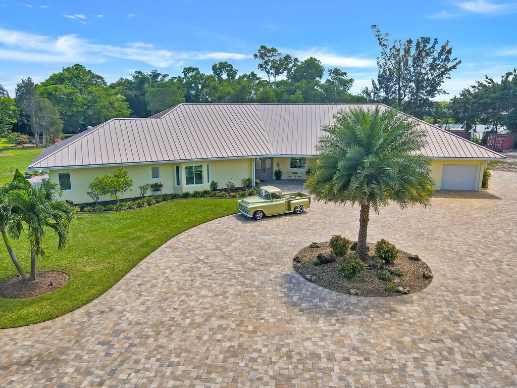 Photo of 6624 Dillman Road, Greenacres, FL 33413 (MLS # R11168637)
