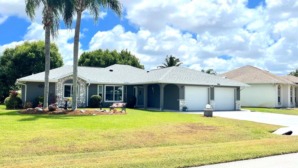 Photo of 1873 NE Acapulco Drive, Jensen Beach, FL 34957 (MLS # R10982033)