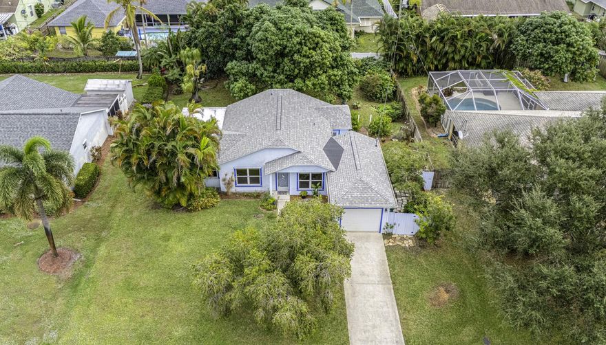 Discover incredible value in North Port St. Lucie! At just $295,000, this 3-bed, 2-bath gem is the smart buy you've been waiting for. The big-ticket item is handled; enjoy total peace of mind with a 2023 roof! Tucked into an established neighborhood with easy I-95 access, you're perfectly positioned for work and play. Relax in your private outdoor seating area surrounded by lush fruit trees, or take a quick drive to the waterfront excitement of downtown Fort Pierce. Enjoy local breweries, cideries, shopping and dining or catch a game at the nearby St. Lucie Mets ballpark. With a 1-car garage and unbeatable value, this home offers the lifestyle you want at a price you'll love. Come see it today!