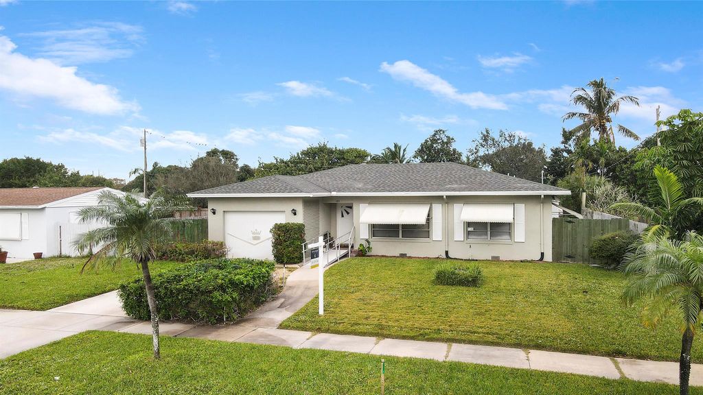 Photo of 121 Bayberry Drive, Lake Park, FL 33403 (MLS # R10946306)