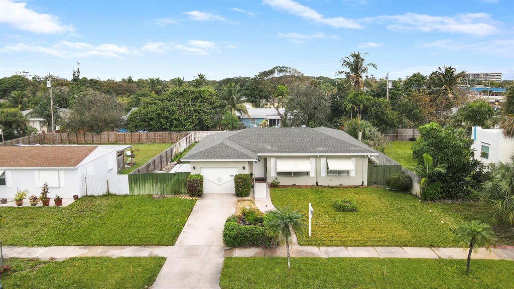 Photo of 121 Bayberry Drive, Lake Park, FL 33403 (MLS # R10946306)