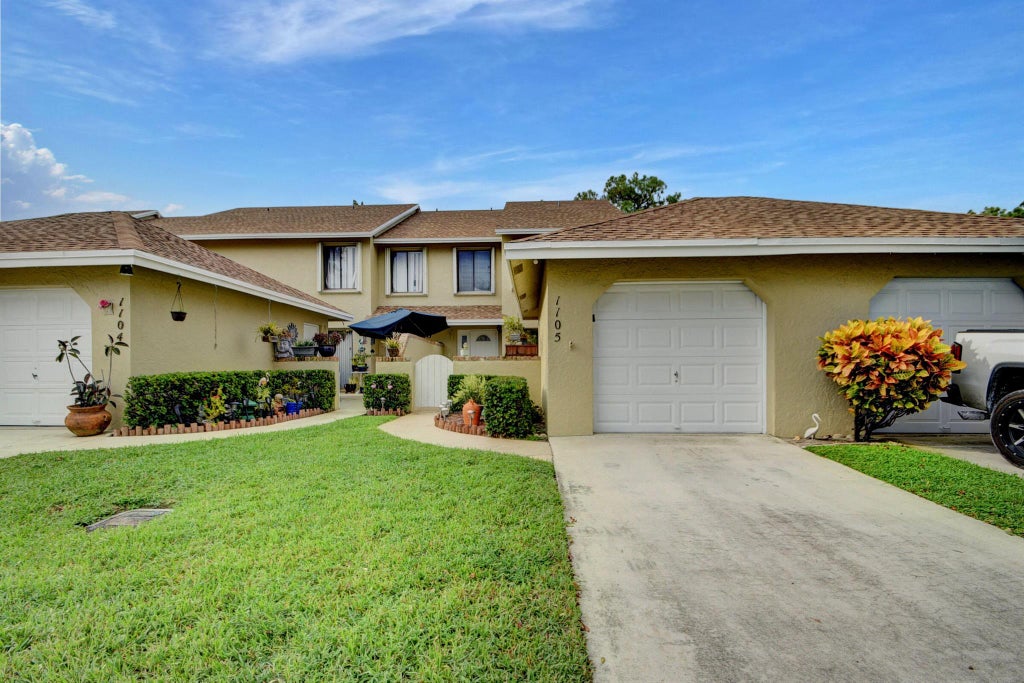 Photo of 1105 Maplewood Drive, Greenacres, FL 33415 (MLS # R10915248)