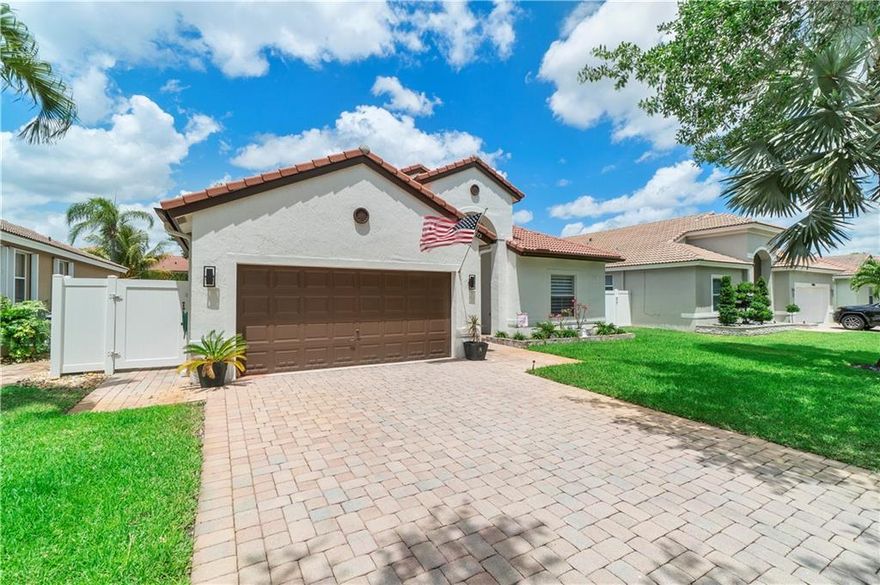 TURN-KEY single-story home in the beautiful gated community Sunset Lakes with resort style amenities and low HOA. This triple split floor plan features 4 large bedrooms and 3 full bathrooms, fresh with new vanities, fixtures, and faucets and has and additional BONUS ROOM that can be used as a gym, office, or 5th bedroom. New modern zebra blinds with electric powered blackout blinds in master and living room. Tiled garage floor includes overhead storage shelving system and large attic. Reverse osmosis system and whole home water filtration system. Beautifully landscaped front yard gives this home charming curb appeal and the tropical backyard has mature fruit trees, new landscape lighting, and room for a pool.  13.46 KW Solar system will save $$$ on monthly electrical costs.