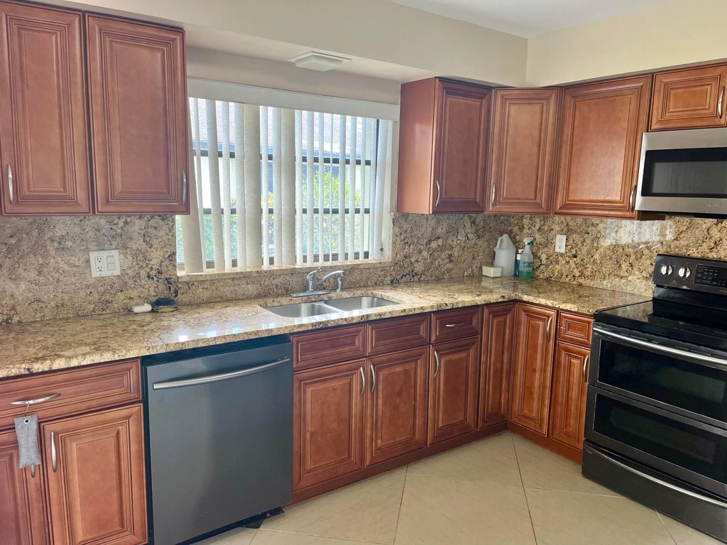 Photo of 4951 Equestrian Circle #A, Boynton Beach, FL 33436 (MLS # R11168885)