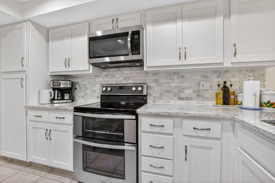 Stunning Boca Raton townhome offering exceptional space & value. Boasting 2,739 total SF (2,105 under air + 100 SF Florida room). Vaulted ceilings & extra windows provide light-filled living areas with fireplace & a spacious floorplan. Remodeled kitchen with quartz counters, double oven & French door refrigerator. Roof 2023 & flat roof 2025. Impact-rated Florida room with impact doors & glass overlooks wide open greenspace. Half bath downstairs. Three Bedrooms span the entire top floor, highlighted by a spacious primary suite with private balcony & additional sitting area. Primary bath w Roman tub. Second bath offers walk in shower. One-car garage & long driveway. Clubhouse pool & spa. Centrally located near Boca's top restaurants, premier golf, shopping, mall, beaches & A-rated schools.