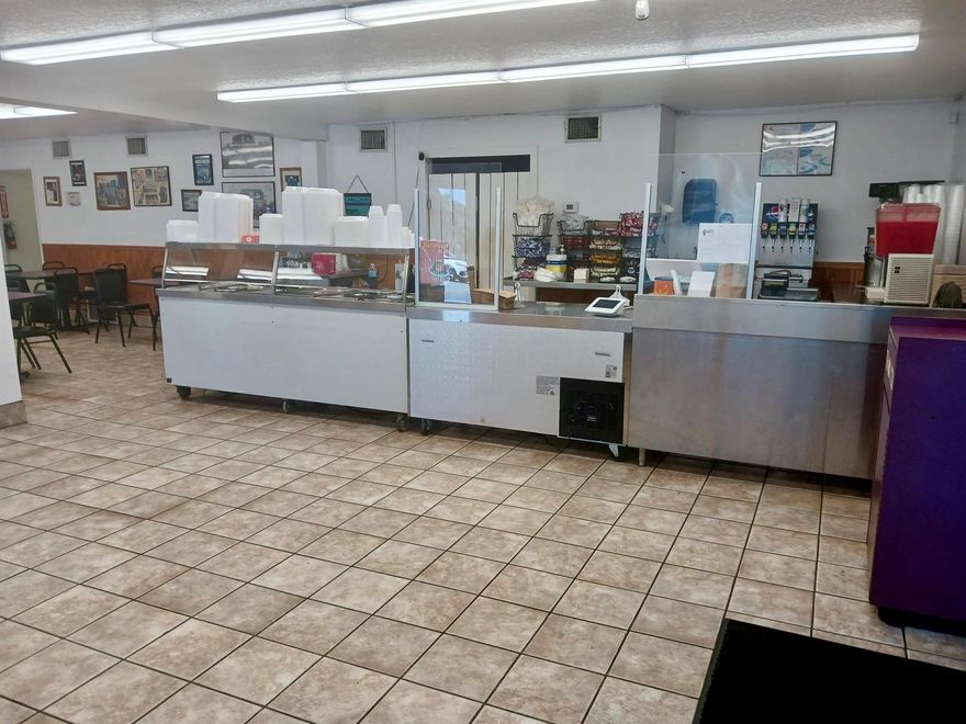 Exciting Restaurant Opportunity in Prime Location! Don't miss the chance to own your own restaurant in the heart of town! This 2,012 sq ft building is fully equipped with everything you need to get started, featuring an extensive inventory list. The property is zoned for Core-Commercial/Office/Entertainment, offering versatile opportunities for your business. Please note, the franchise is not included in the sale--this offer includes the building and equipment only. Additionally, the sale includes two adjacent properties currently used for parking, providing a combined total of 0.38 acres. This is a rare opportunity to bring your culinary vision to life in a bustling central location.