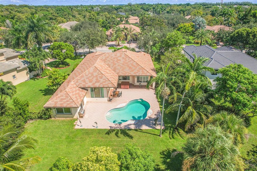 Envision yourself in this warm and authentic Parkland home, where comfort meets elegance and Endless Potential.
This property sits on a generous 17,500 sq. ft. lot, offering plenty of space for outdoor living and future possibilities.