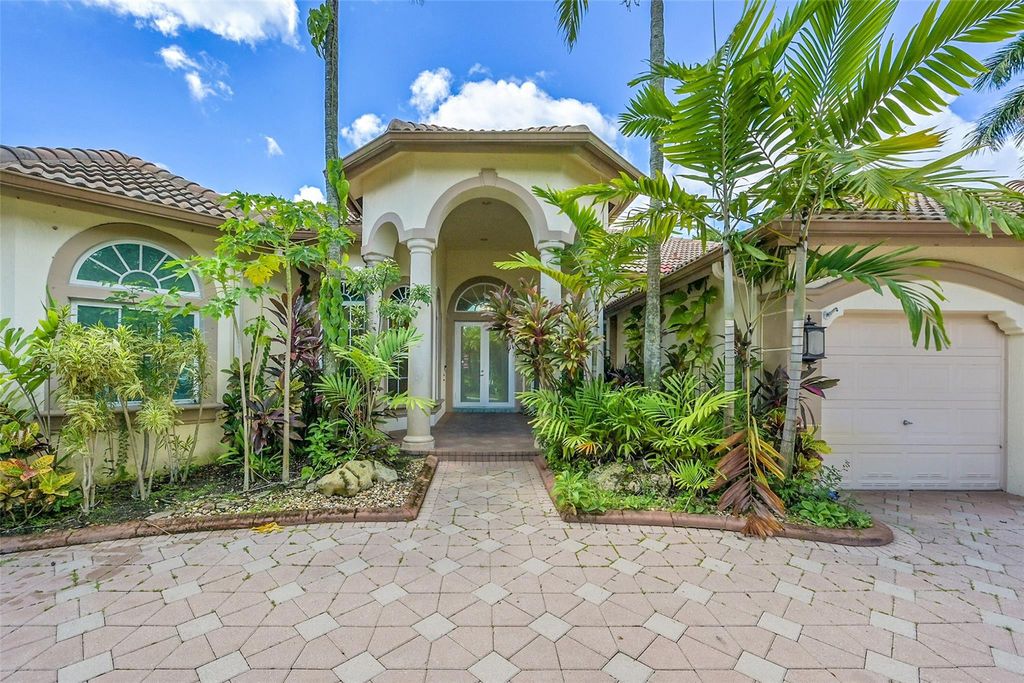 Photo of 9350 NW 62nd Court, Parkland, FL 33067 (MLS # F10520531)