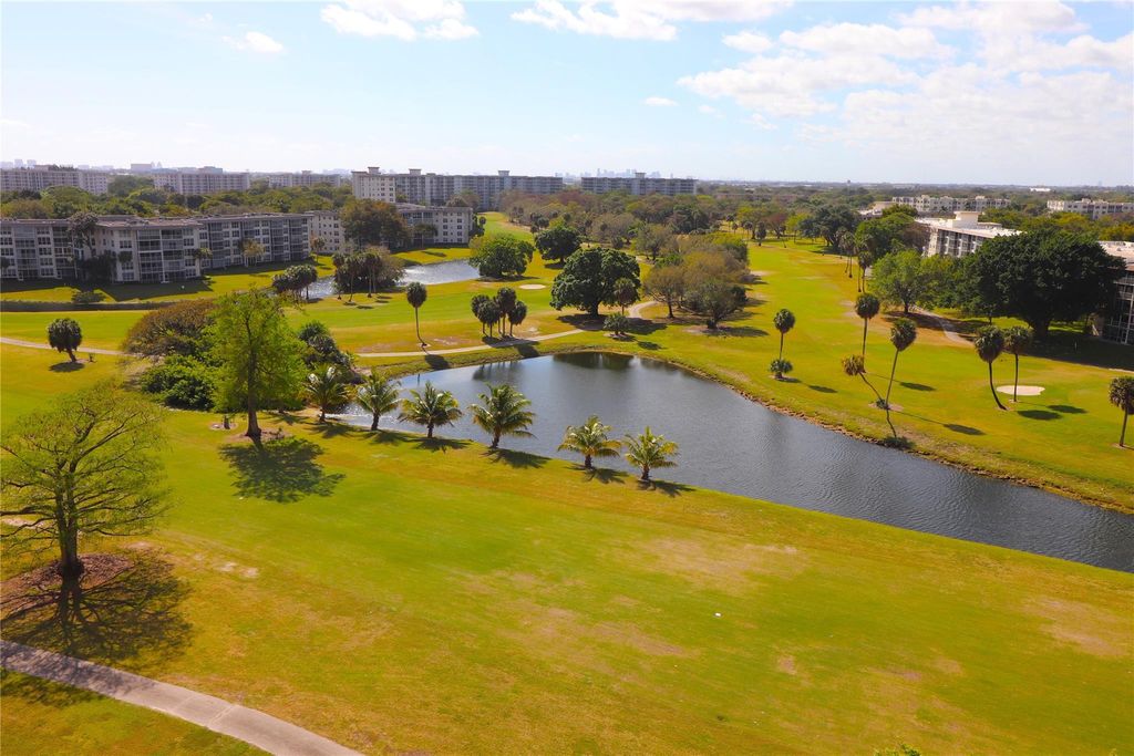 Photo of 3520 Oaks Way #104, Pompano Beach, FL 33069 (MLS # F10426297)