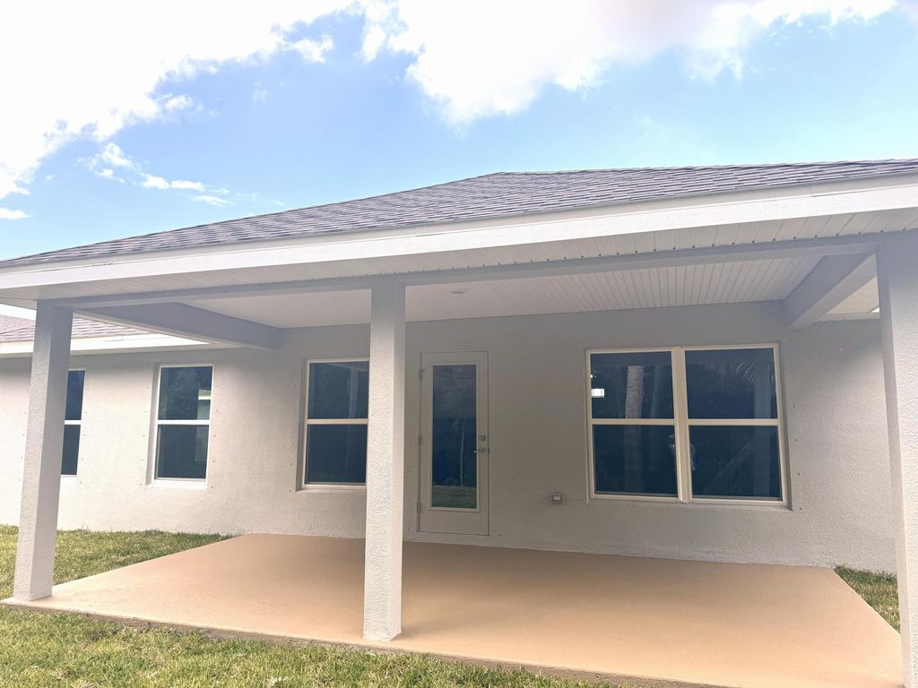 Photo of 5717 Waterstone Boulevard, Fort Pierce, FL 34951 (MLS # R10988449)