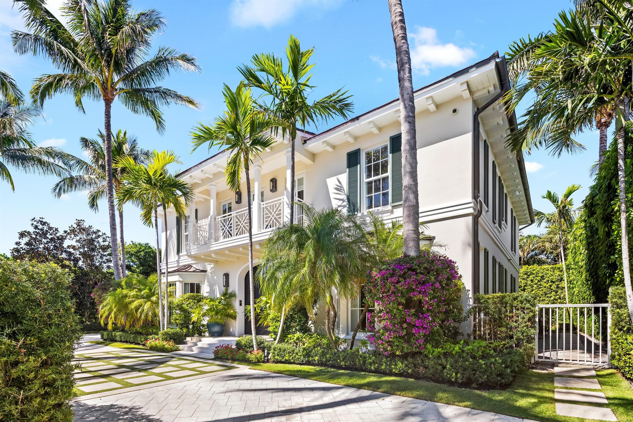 Welcome to 253 Jamaica Lane, a like-new Colonial residence on the North End of Palm Beach Island. Built in 2016 by Shapiro Pertnoy Companies and designed beautifully by Hive, this property offers 4 bedrooms, 5.2 bathrooms, a top-of-the-line Chef's kitchen, an elevator, fish tank, impact glass, a 2 car garage, and heated pool/spa. Boasting a vast outdoor pool loggia accessible through French doors in all the main level rooms, this pristine tropical residence also features a Gourmet chef's kitchen which opens into the family room, a gorgeous library or office. The primary suite includes a balcony, dual baths, and custom walk-in closets.